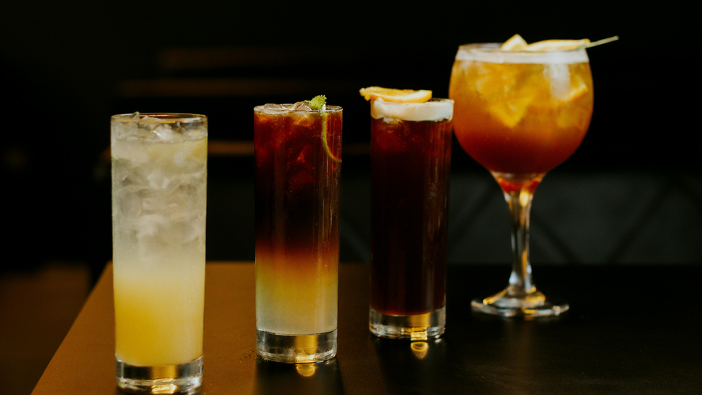 Trying Elegant alcohol-free cocktails in assorted glassware