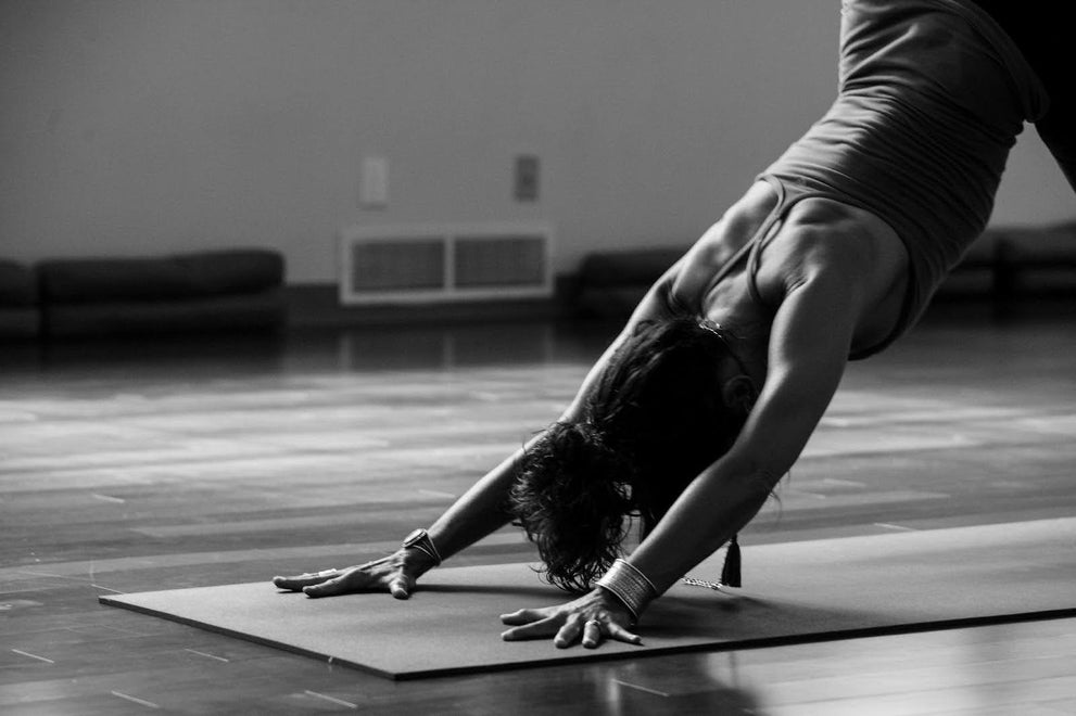 Woman in a downward dog pose